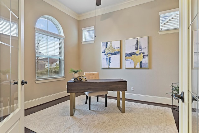 office featuring ornamental molding, french doors, ceiling fan, and light wood-type flooring