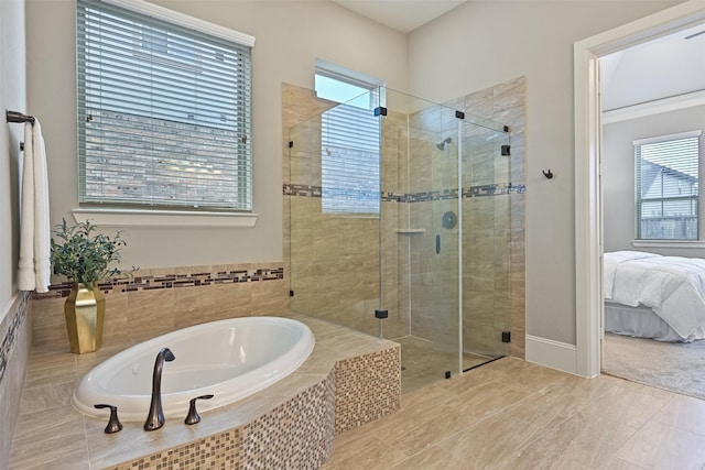 bathroom with independent shower and bath