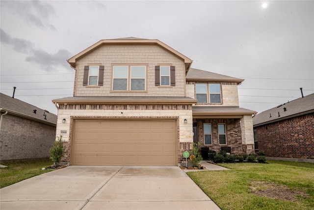 view of front of home featuring a garage and a front lawn