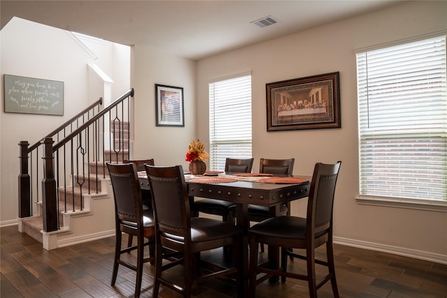 dining room featuring dark wood-type flooring