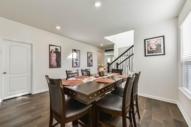 dining space featuring dark wood-type flooring, stairway, recessed lighting, and baseboards