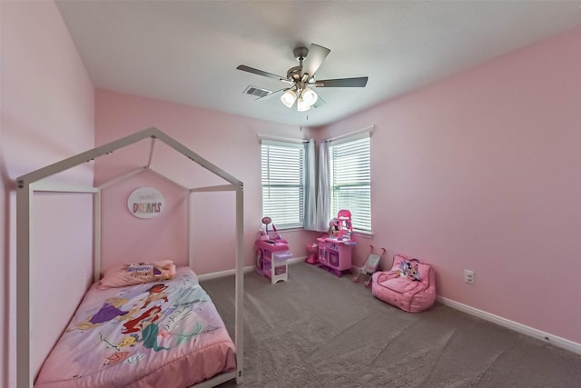 bedroom with a ceiling fan, carpet flooring, visible vents, and baseboards