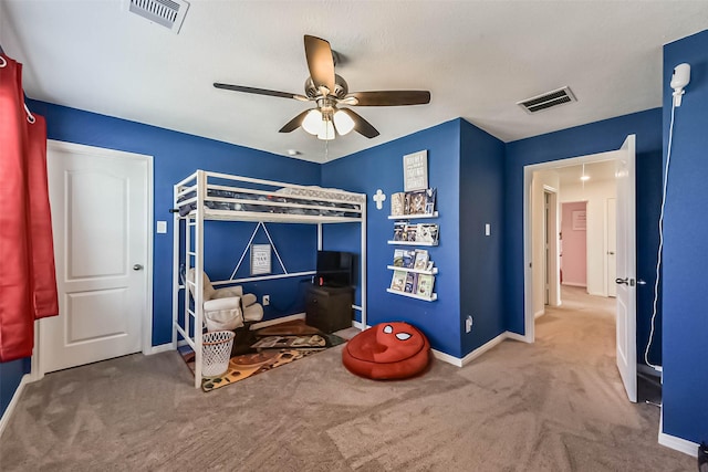 bedroom with carpet, visible vents, and baseboards