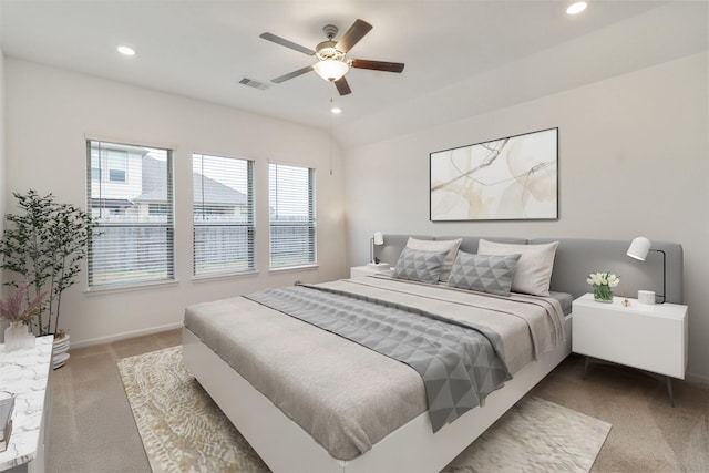 bedroom featuring dark colored carpet and ceiling fan