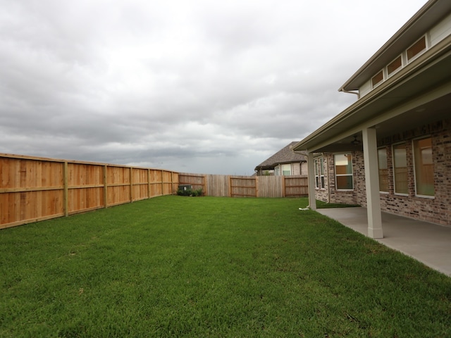 8515 Pier Cove Dr, Cypress, TX 77433 - fenced backyard with a patio area