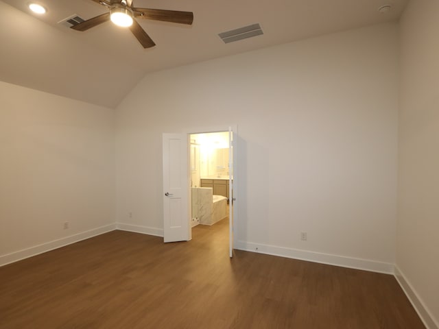 8515 Pier Cove Dr, Cypress, TX 77433 - unfurnished room with ceiling fan, dark wood-style floors, and lofted ceiling