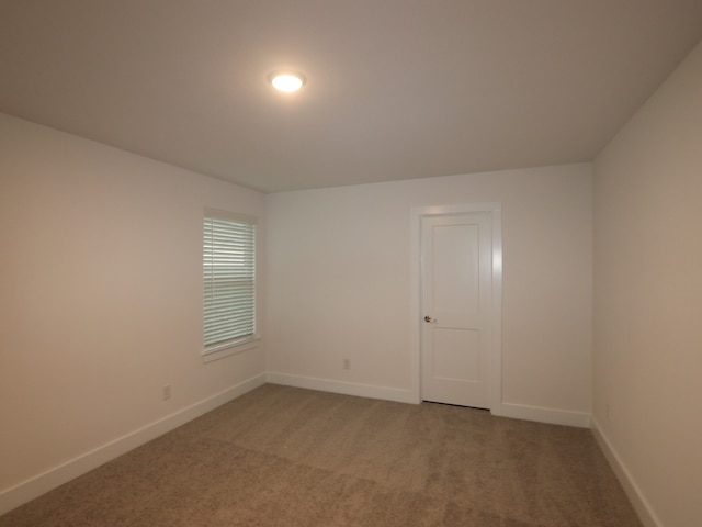 8515 Pier Cove Dr, Cypress, TX 77433 - unfurnished room featuring baseboards and carpet floors