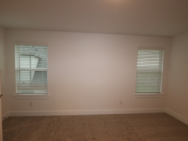 8515 Pier Cove Dr, Cypress, TX 77433 - spare room with carpet floors