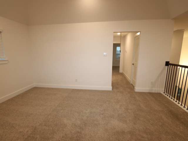 8515 Pier Cove Dr, Cypress, TX 77433 - carpeted empty room with baseboards