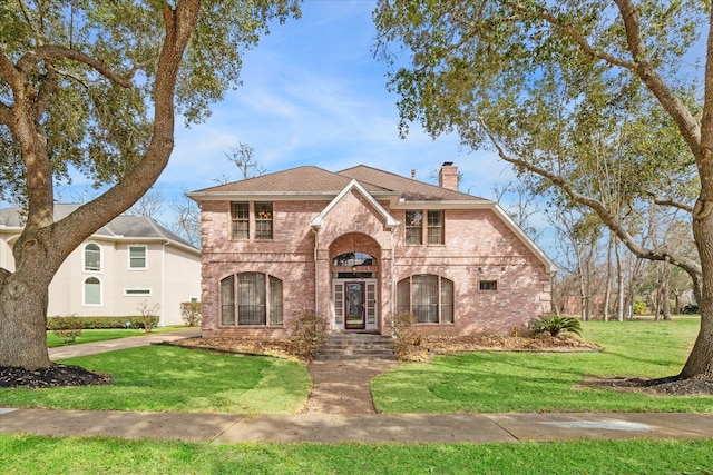 view of front of house with a front yard