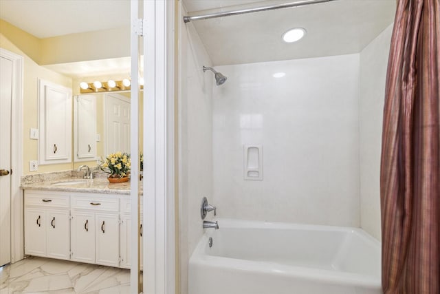 bathroom with vanity and shower / bath combination