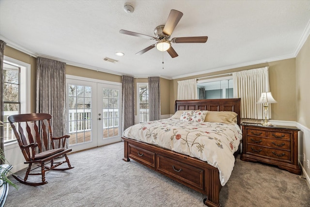 bedroom featuring crown molding, ceiling fan, access to exterior, light carpet, and french doors