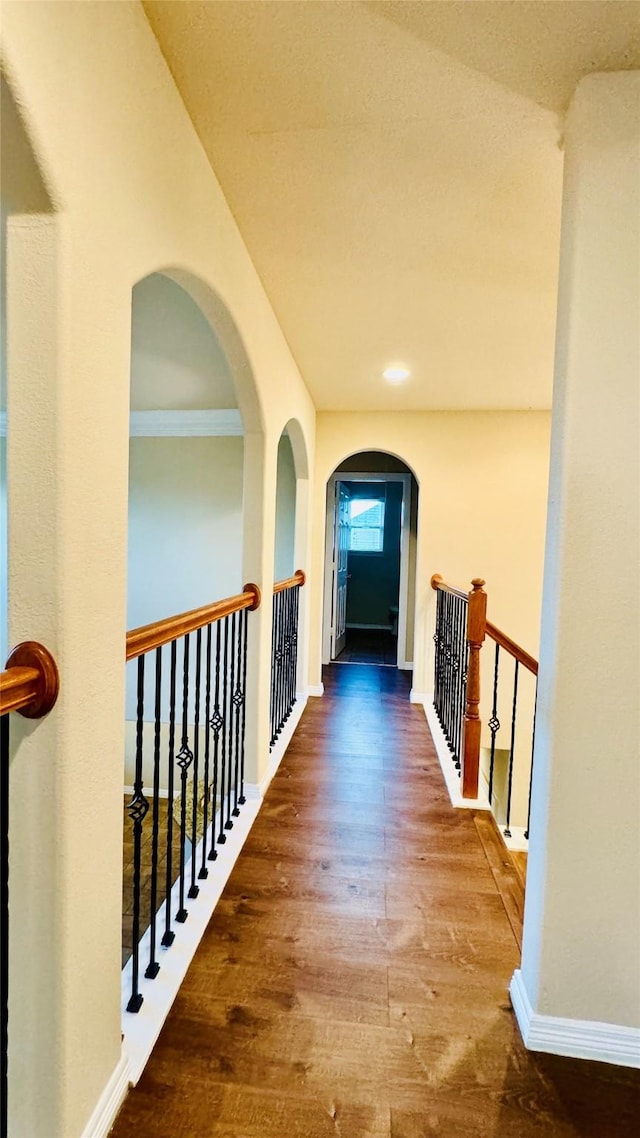 corridor featuring hardwood / wood-style floors