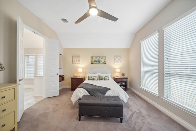 carpeted bedroom featuring ceiling fan and lofted ceiling