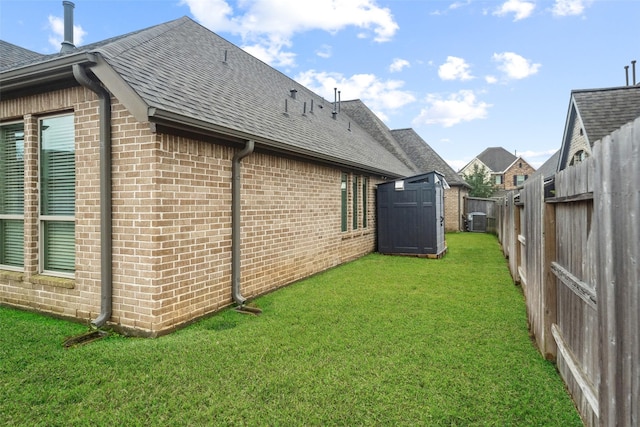 view of yard with central AC unit