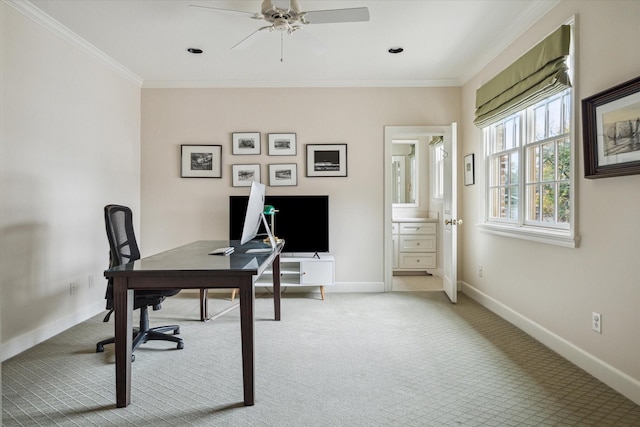 carpeted office with crown molding and ceiling fan