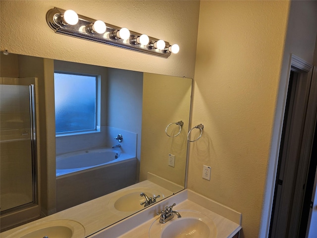 bathroom featuring vanity and separate shower and tub