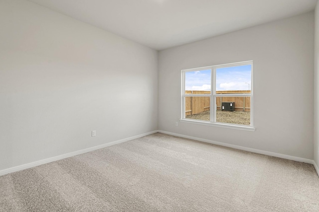 unfurnished room with carpet