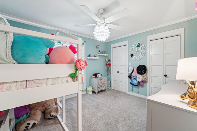 bedroom featuring light colored carpet, ornamental molding, and ceiling fan