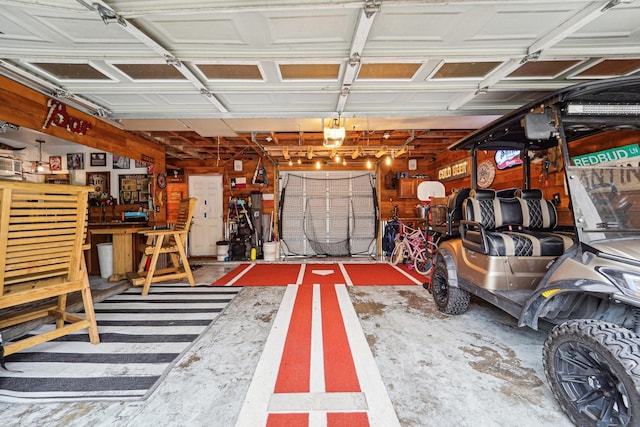 garage with a workshop area