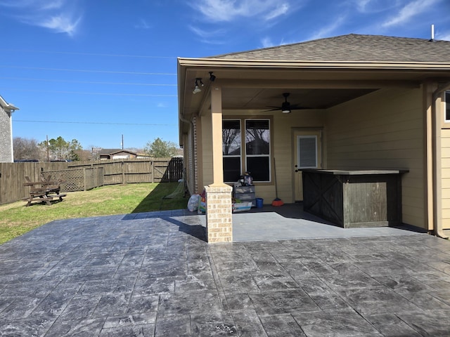 view of patio featuring ceiling fan