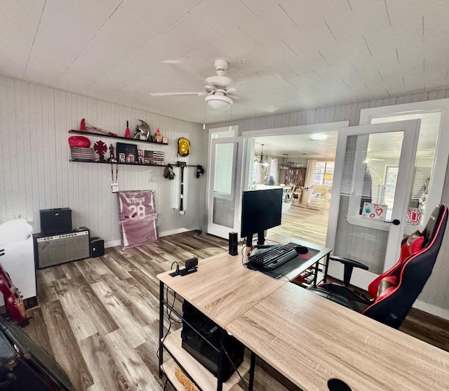 office area with hardwood / wood-style flooring and ceiling fan