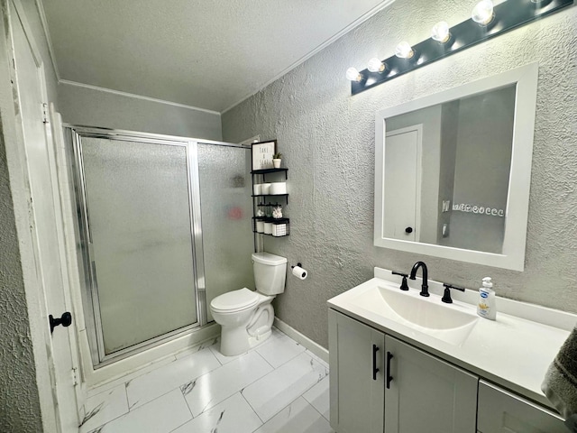 bathroom featuring vanity, toilet, a textured ceiling, and a shower with shower door