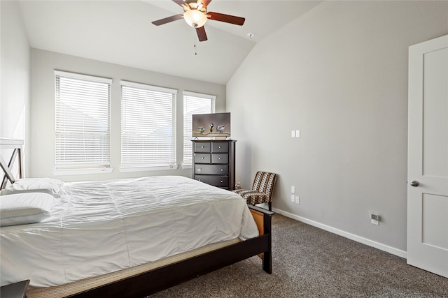 carpeted bedroom with vaulted ceiling and ceiling fan