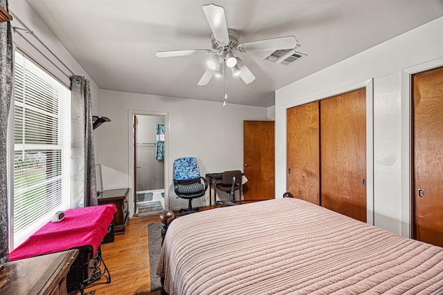 bedroom with ceiling fan and light hardwood / wood-style flooring