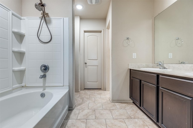 bathroom with tile patterned floors and vanity