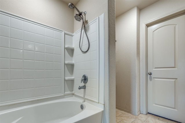 bathroom featuring tile patterned floors and washtub / shower combination