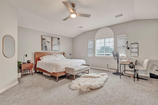 bedroom featuring lofted ceiling, ceiling fan, and carpet flooring