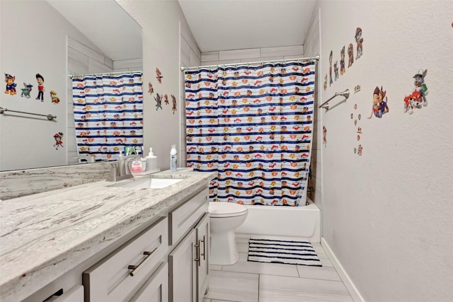 full bathroom featuring vanity, shower / bath combo with shower curtain, and toilet