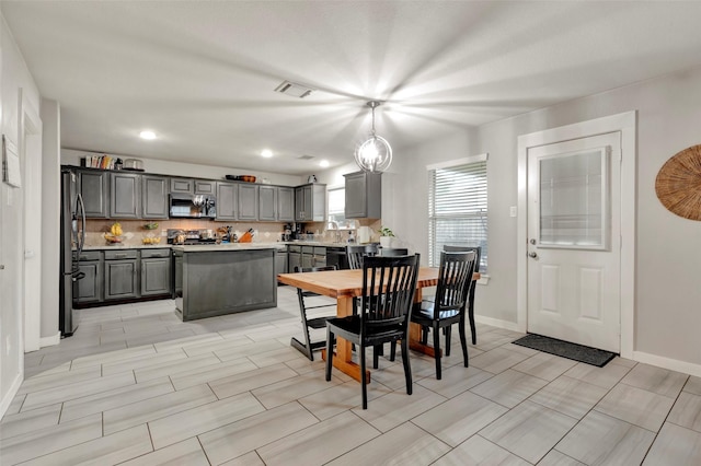 dining space featuring sink