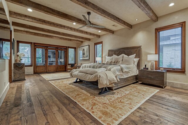 bedroom with light hardwood / wood-style flooring, french doors, beamed ceiling, and access to outside