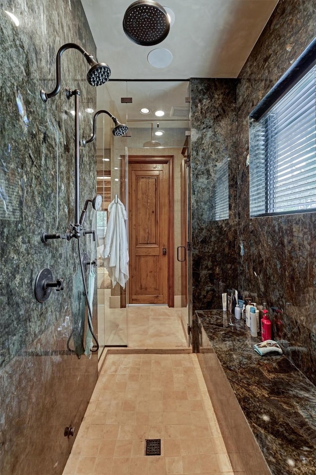 bathroom with an enclosed shower