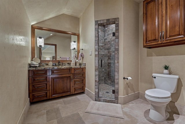 bathroom featuring an enclosed shower, vanity, vaulted ceiling, and toilet