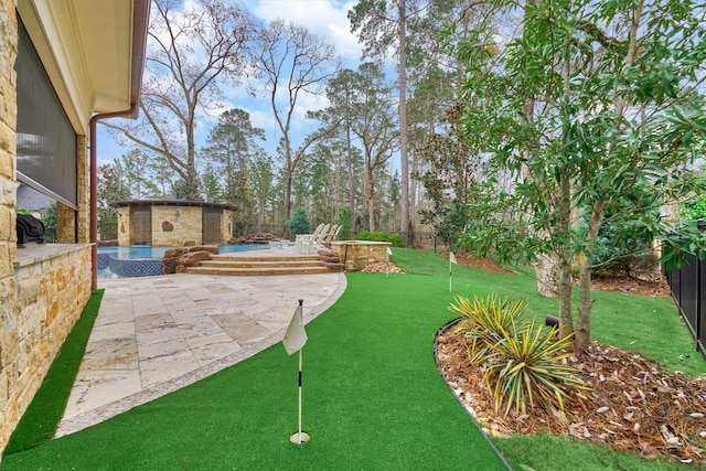 view of yard with a patio area