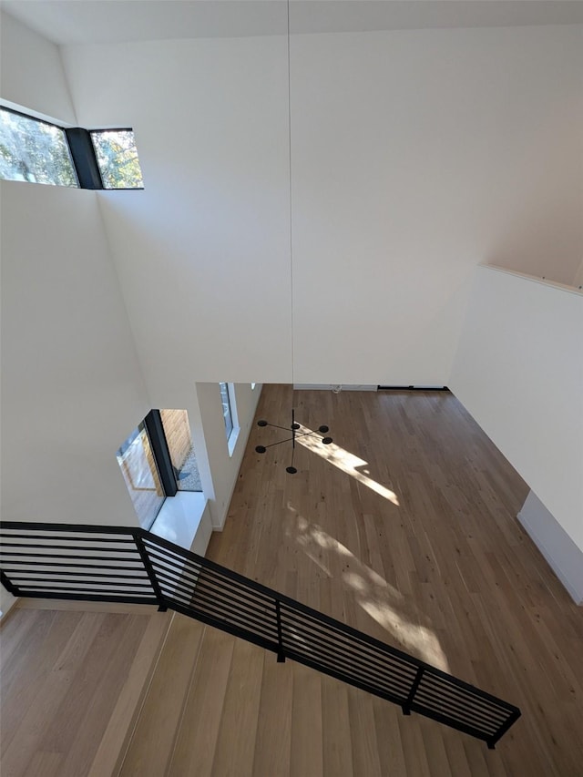 stairway featuring hardwood / wood-style floors