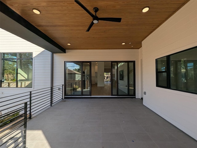 view of patio featuring ceiling fan