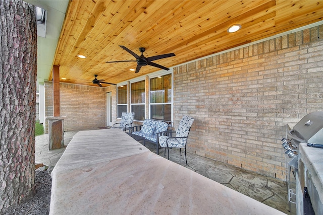 view of patio featuring ceiling fan