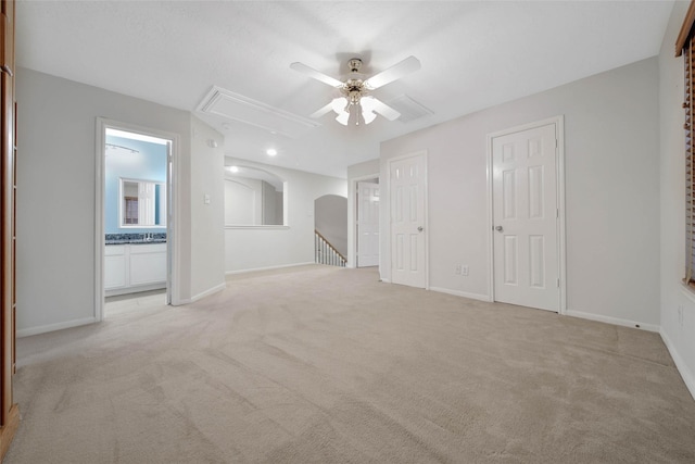 carpeted empty room with ceiling fan