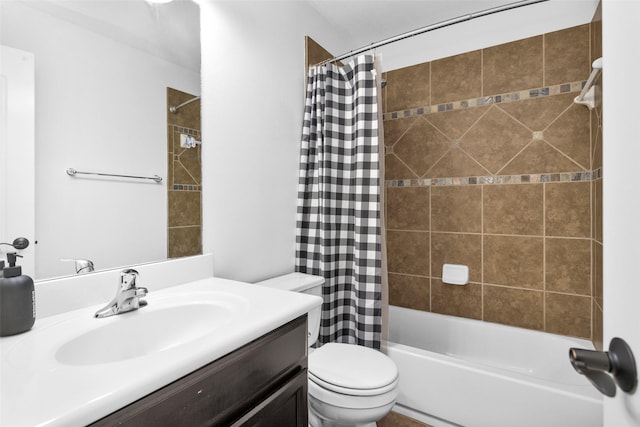 full bathroom featuring vanity, shower / bath combo, and toilet