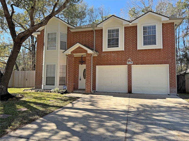 view of front of home featuring a garage, fence, concrete driveway, and brick siding