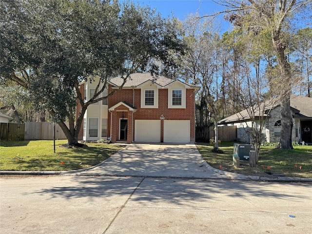 traditional-style house featuring driveway, fence, a front lawn, and brick siding