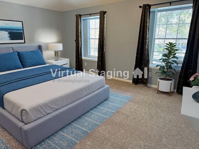 bedroom featuring baseboards