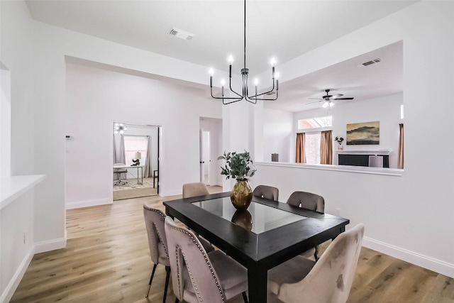 dining area featuring hardwood / wood-style floors