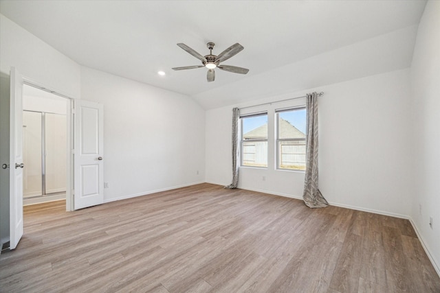14231 Walworth Creek Ct, Rosharon, TX 77583 - empty room with light wood-style flooring, ceiling fan, lofted ceiling, baseboards, and recessed lighting