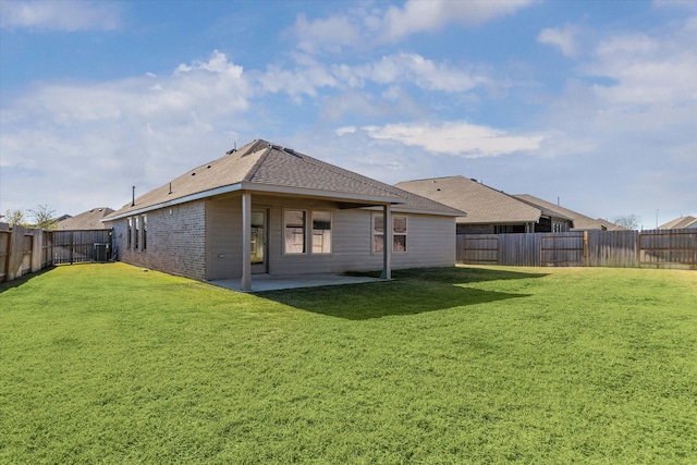 14231 Walworth Creek Ct, Rosharon, TX 77583 - back of property featuring a patio area, cooling unit, brick siding, and roof with shingles