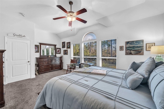 bedroom featuring carpet, lofted ceiling, and ceiling fan